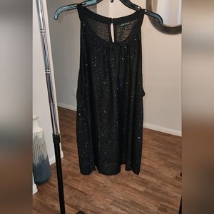 Black sleeveless sequence razor back top.